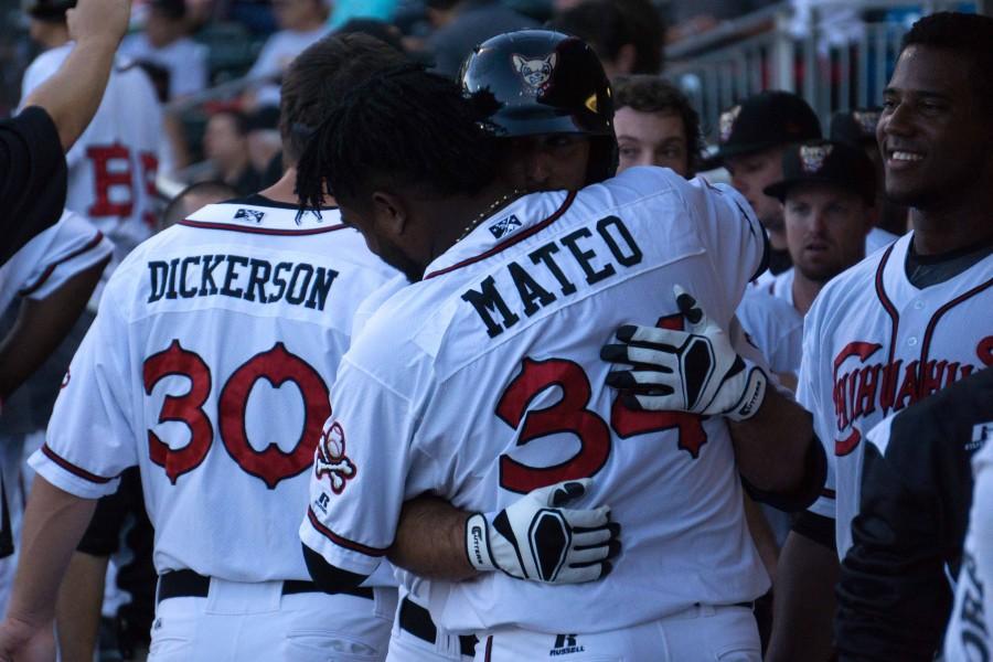 First baseman Tommy Medica is greated by pitcher Marcos Mateo after his three-run homer in the bottom of the first inning.