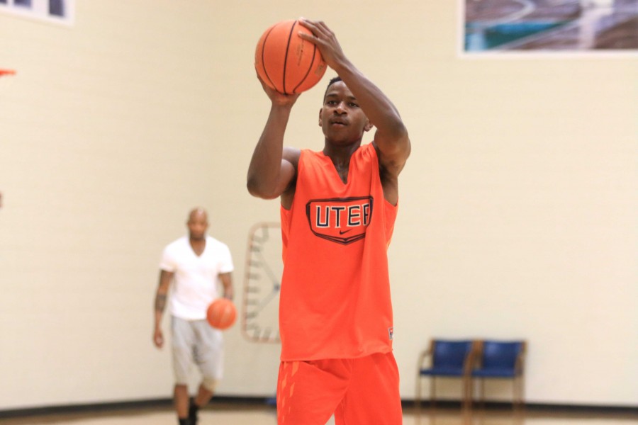 Junior guard Dominic Artis shoots the ball at the Foster Stevens Basketball Center.