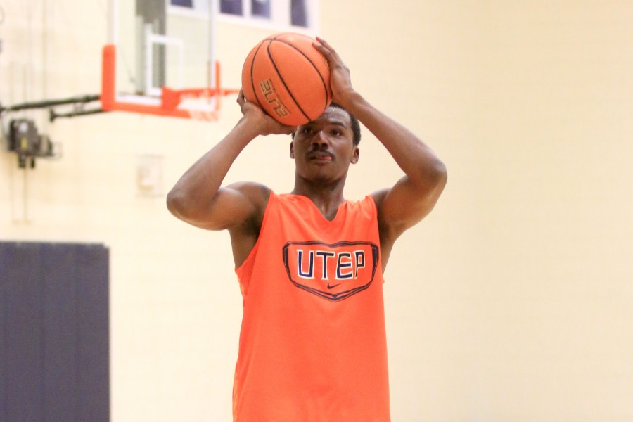 Junior college transfer Lee Moore shoots at the Foster Stevens Basketball Center during his first meeting with the El Paso media.