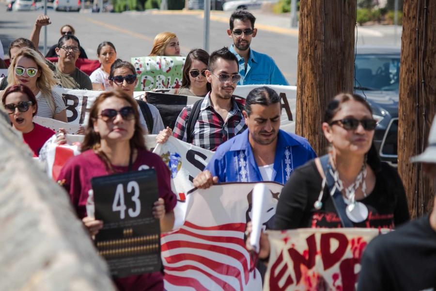 UTEP students march towards Mexican Consulate in commemoration of the 43 missing Ayotzinapa students.