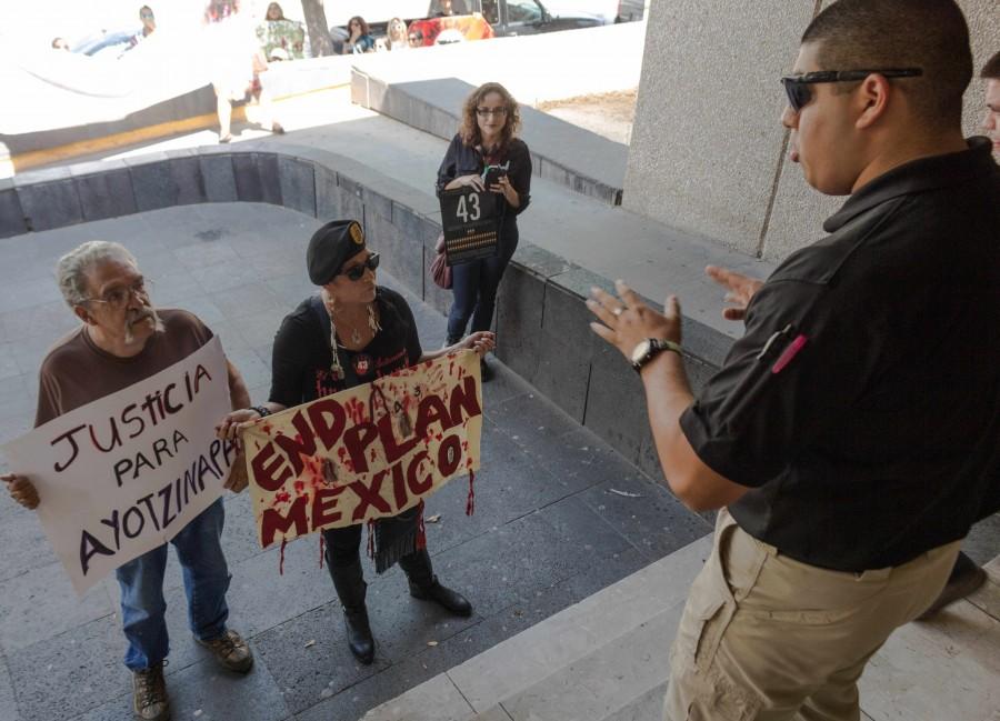 Activists arrive at the Mexican General Consulate office .