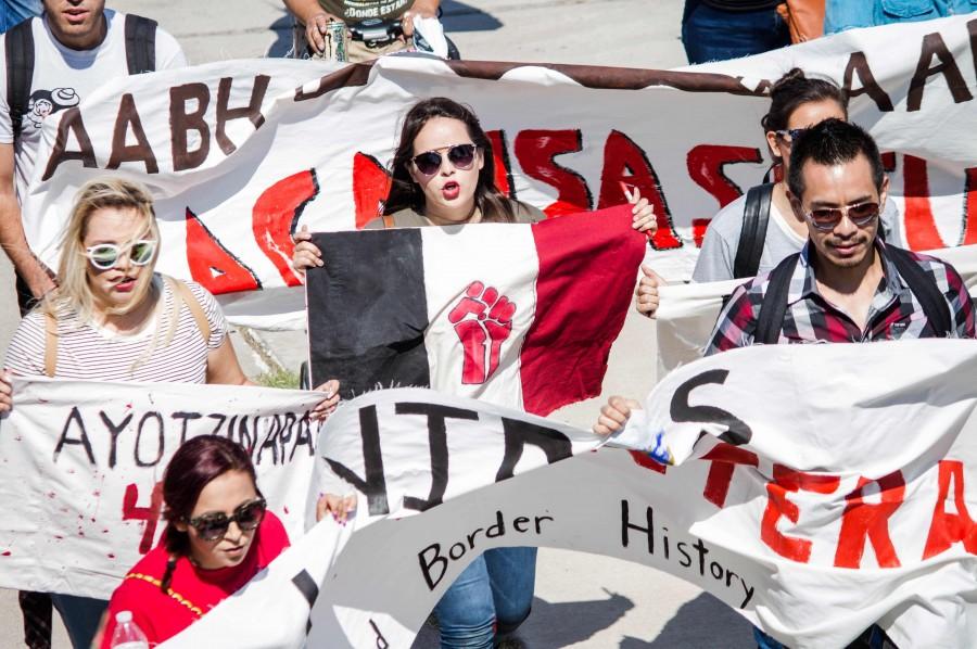 The students used signs in the march. 