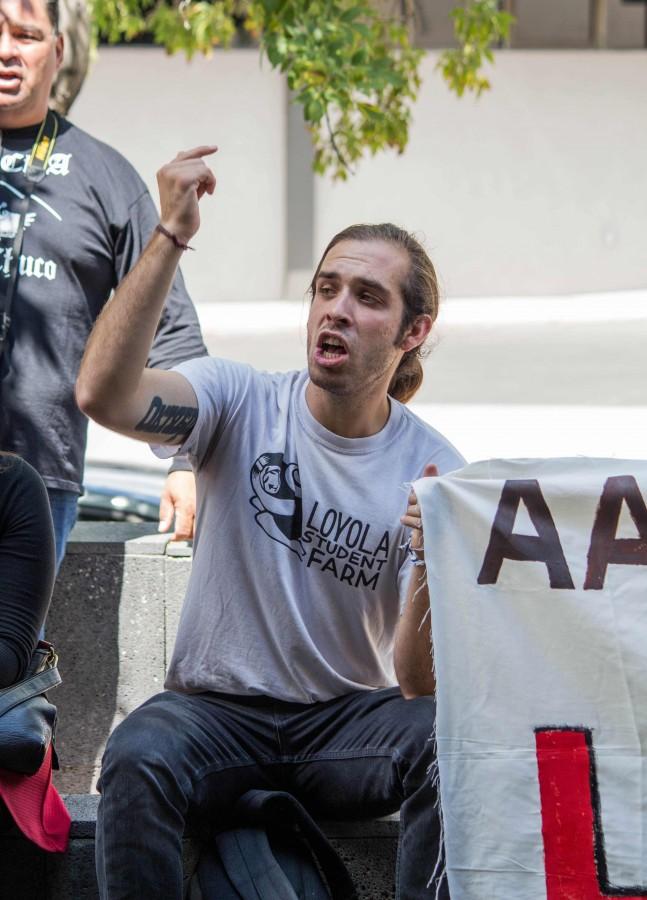 A UTEP student chants during the march. 