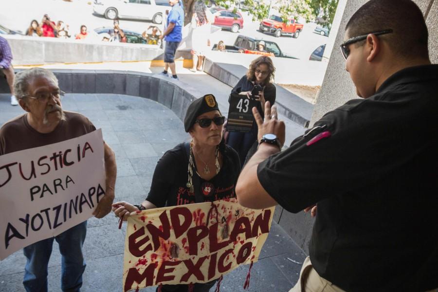 Activists arrive at the Mexican General Consulate office and are told only three participants can go inside.