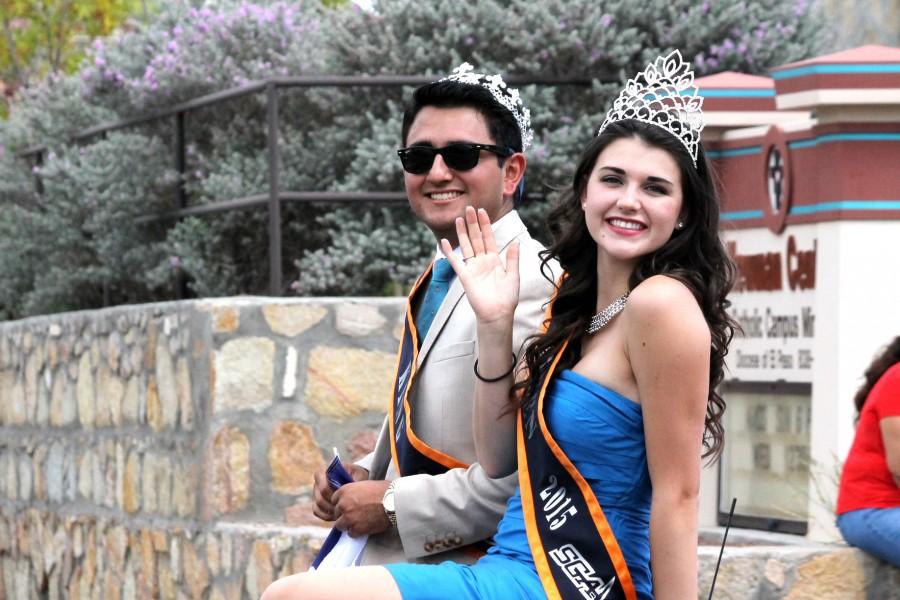 UTEPs king and queen riding through the parade