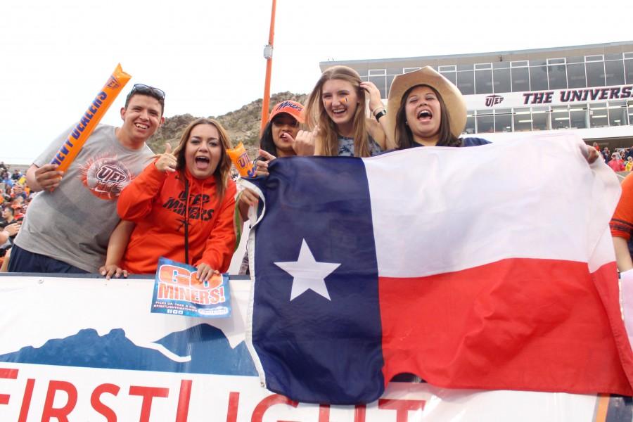 UTEP Miner students cheer for their team for the Homecoming game. 