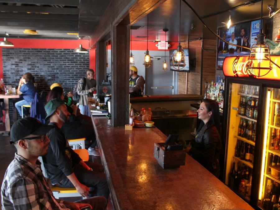 Customers enjoy spending their time at BarMen, a new bar/restaurant that serves tacos and other traditional Mexican dishes. 