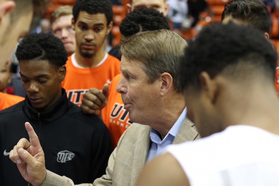 Coach Tim Floyd speaks with his players before the game versus Alcorn.