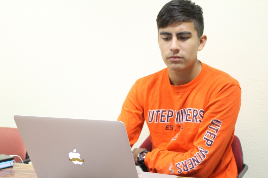 Sophomore finance major Benji Rodriguez studies for his finals at the library.