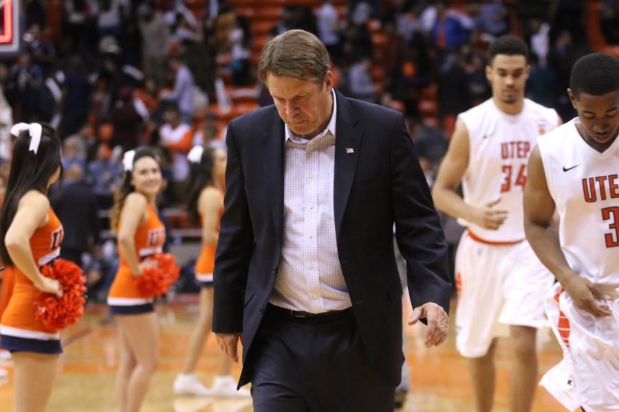Head coach Tim Floyd looks down after a 73-53 loss to NMSU.