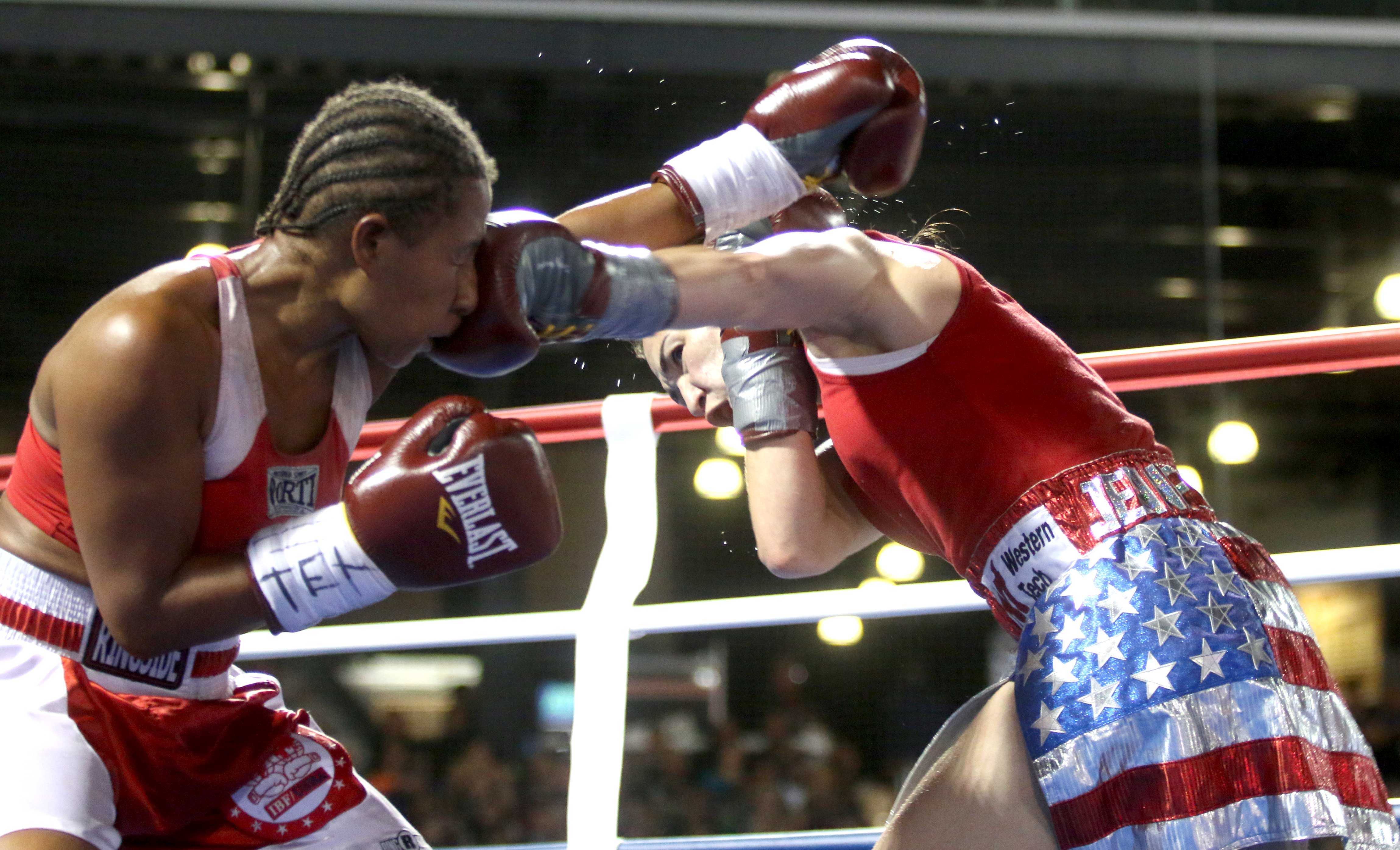 Jennifer Han (right) became El Paso’s first boxing world champion in front of 1,500 fans at Southwest University Park on Apr. 30, 2016.