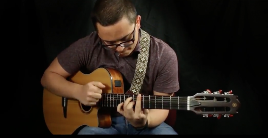 Arturo Gonzalez improvises with the guitar. 