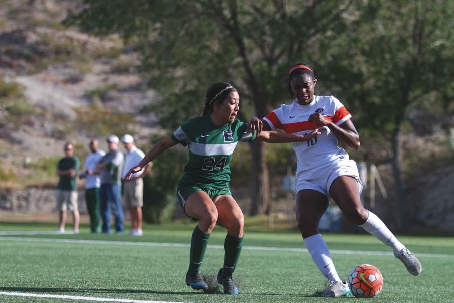 Junior defender Alexa Bain blacks the shot from Eastern New Mexico forward Erin McAnarney on Saturday, April 23. 