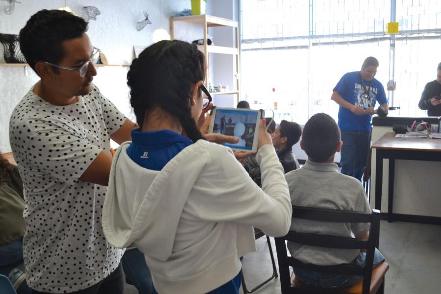 Executive Director Gustavo Arriaga shows a student from Clint Junior High School how the 3D-scanner at Fab Lab works. The lab is located at 806 Montana in central El Paso. 