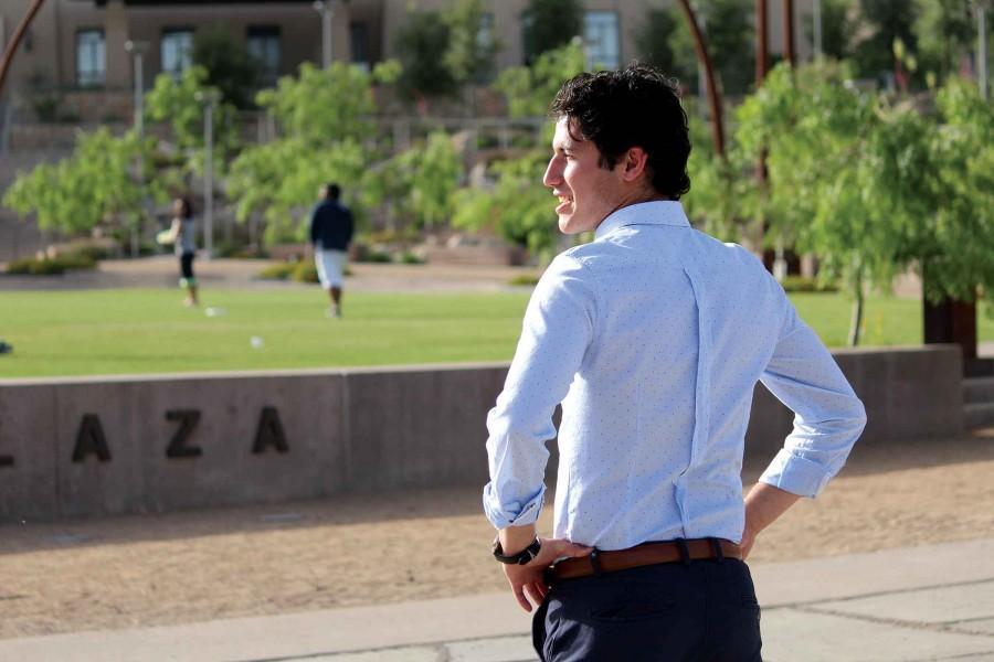 Newly elected Student Government Association president, sophomore operation chain supply management major Sergio Baltazar looks over the Centennial Plaza. 