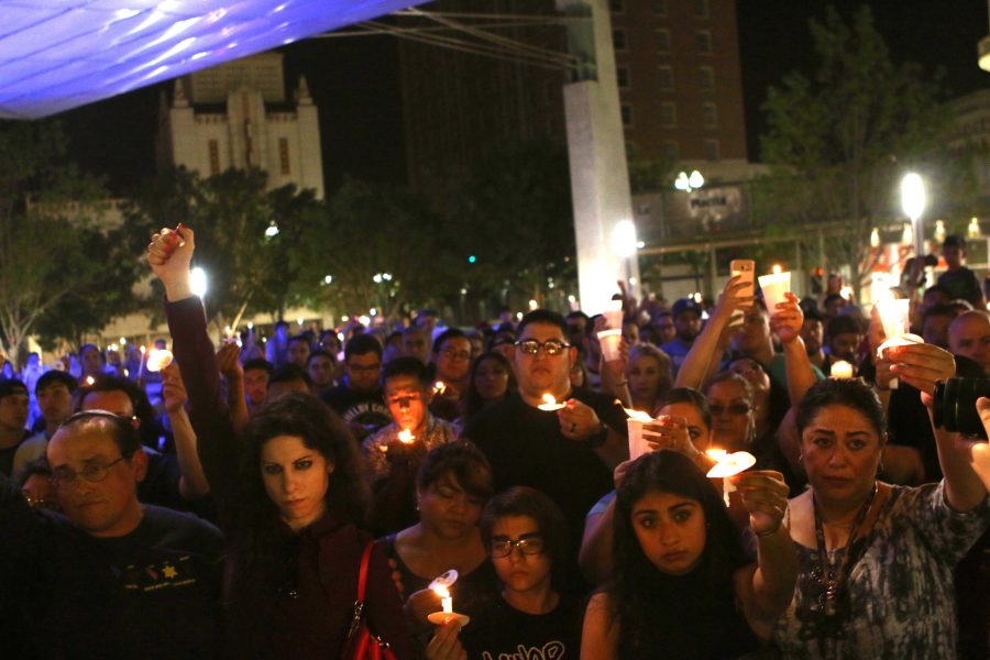 El Pasoans gather around San Jacinto Plaza to mourn the 50 lives lost in the Orlando night club shooting on Sun. June 12. 