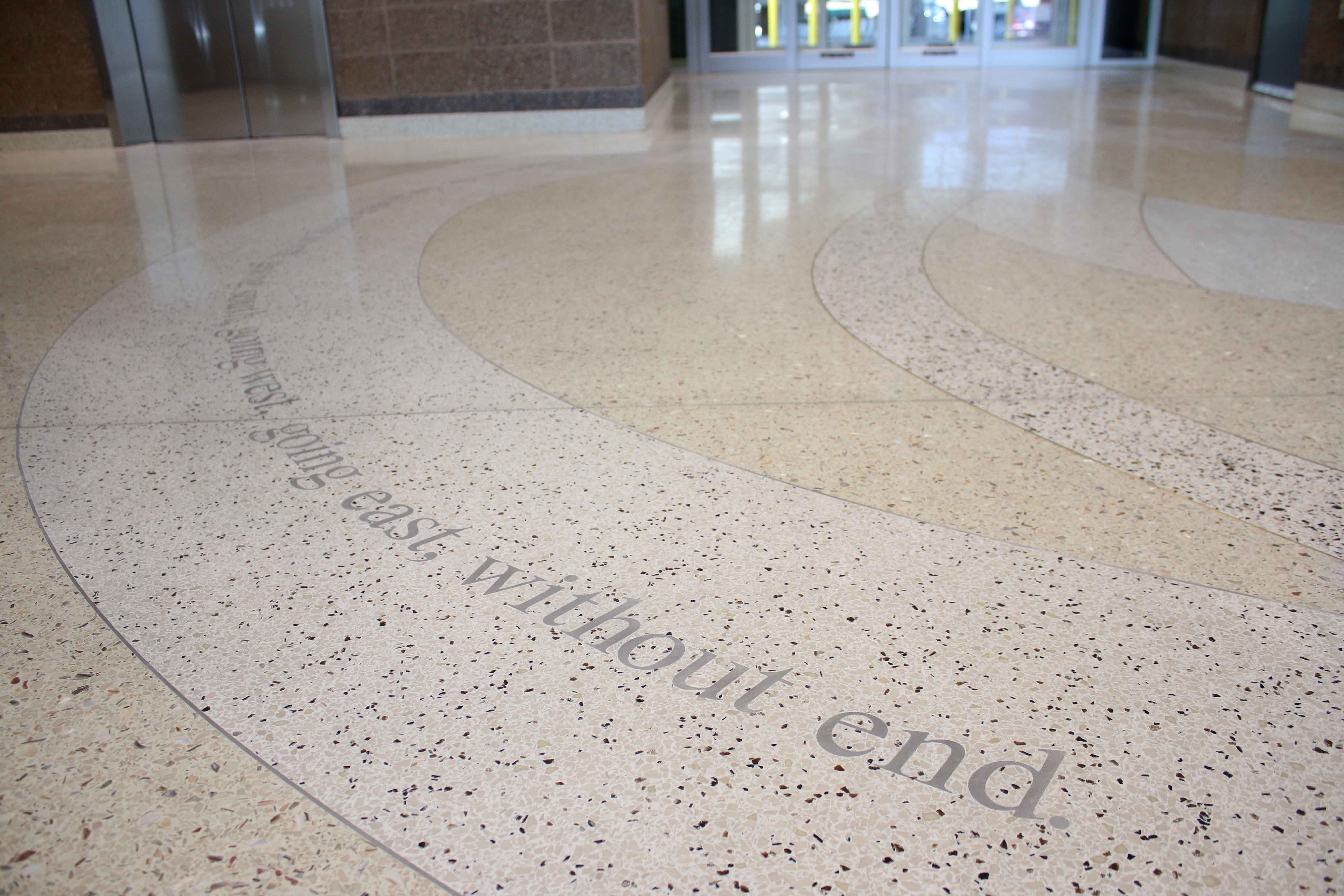 UTEP creative writing assistant professor Sasha Pimentel’s poem runs across the new terrazzo floor at the El Paso International Airport.
