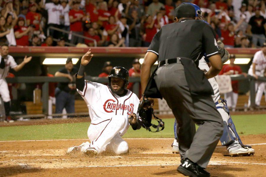 Chihuahuas rally in the eighth to win game one