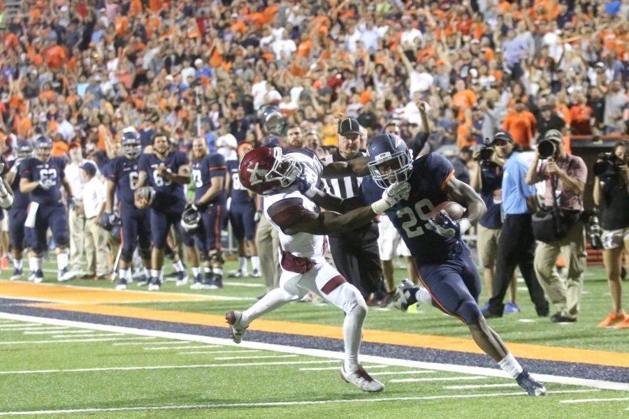 Aaron Jones scores a 75-yard touchdown against the Aggies. 