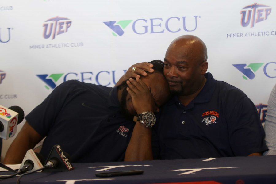 Aaron Jones leans on his father, Alvin Jones Sr., during his emotional announcement. 