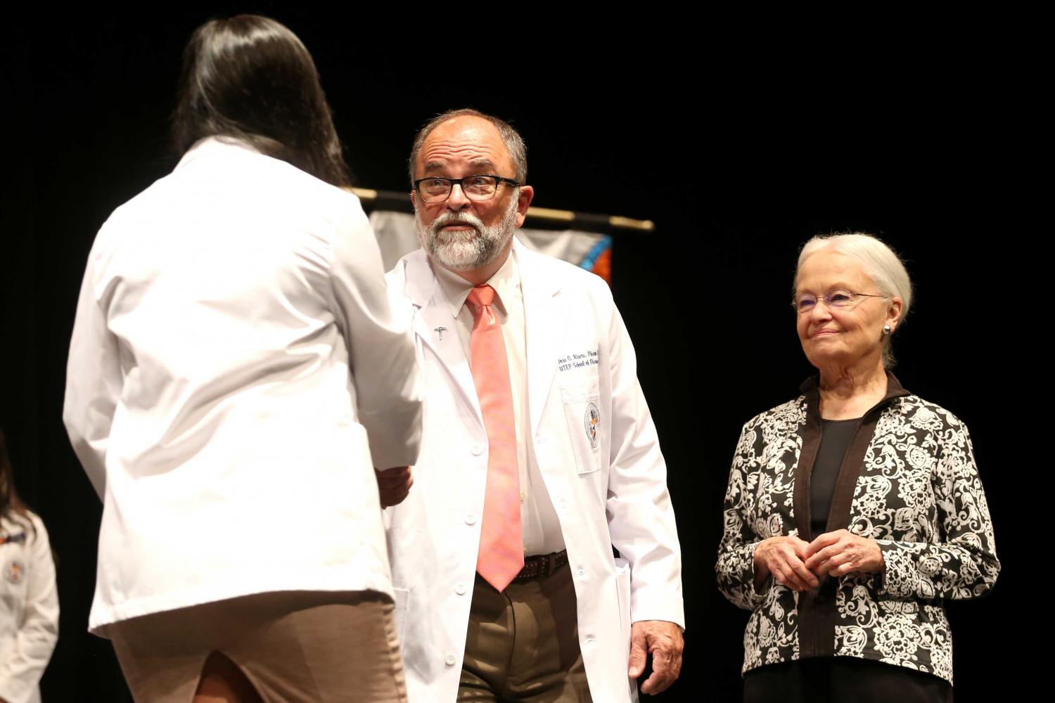 Dr. Natalicio and founding Dean Dr. Jose O. Rivera congratulate the students.