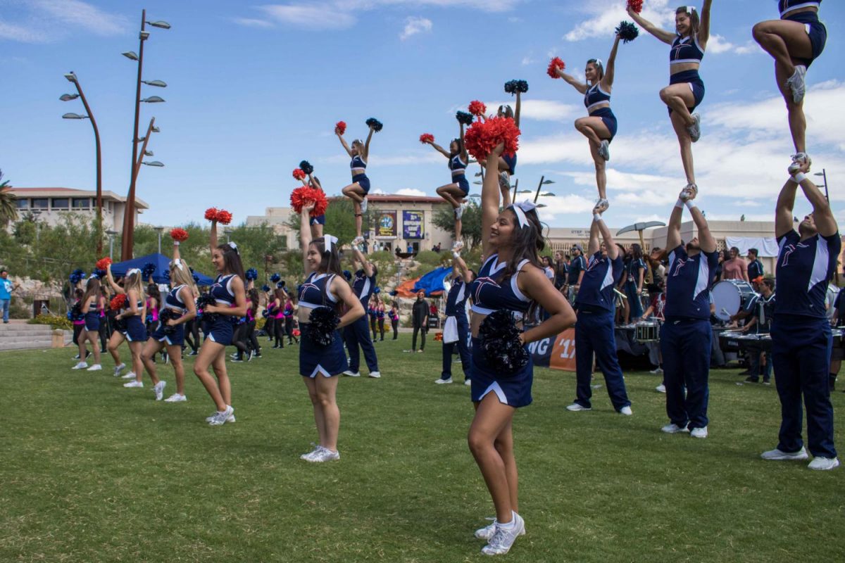 UTEP cheerleaders and Gold Digger preformed during the Homecoming Pep Rally at centennial plaza.