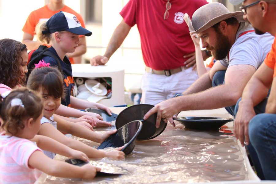 Children learn how to shift for gold.