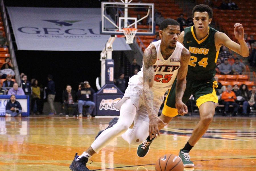 Keith Frazier goes past his defender as he leads the Miners in scoring, 18 points.