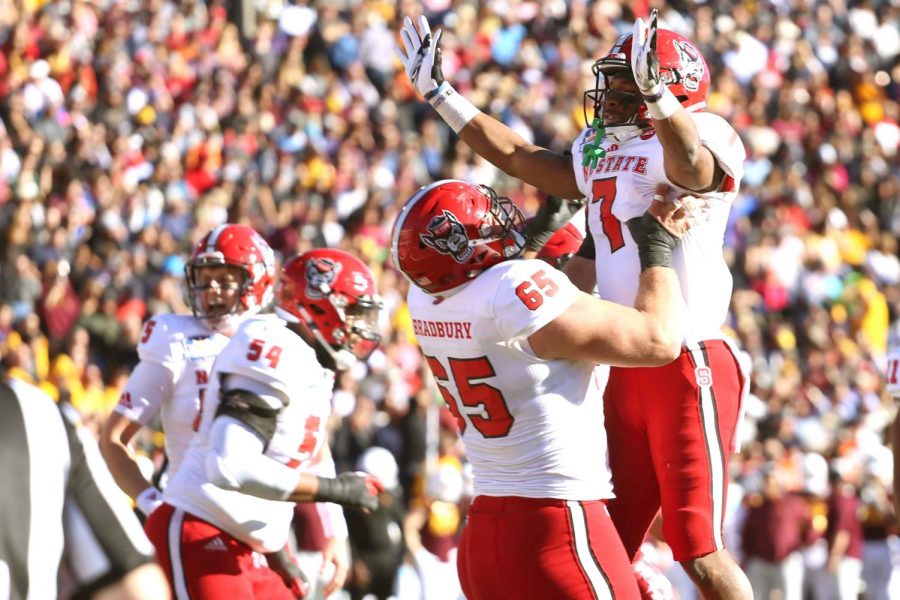 NC State running back Nyheim Hines scored three touchdowns as he led his team to victory. 