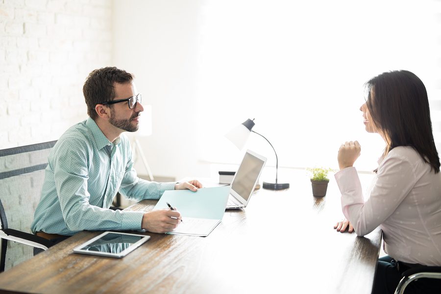 Woman giving her best impression to her interviewer and potential boss while applying for a job