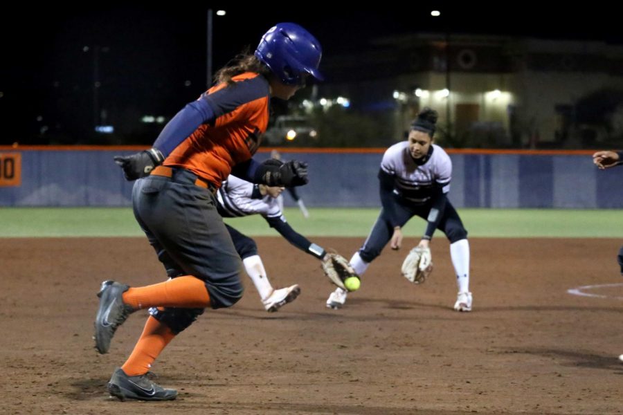  Junior Kacey Duffield attempts to advance on base.