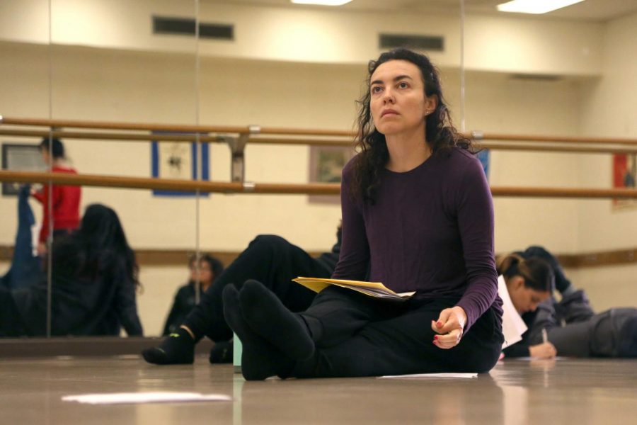 Cristina Goletti, a dancer and associate professor and chair of the theatre and dance department at UTEP, listens to her dance pedagogy students presentations. 