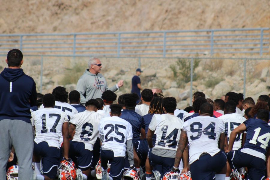 Dana Dimel addresses his team after their first practice back in 2018.