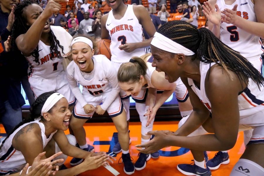 The Miners celebrate their 80-75 win against WKU on Saturday, March 3 at the Don Haskins Center.