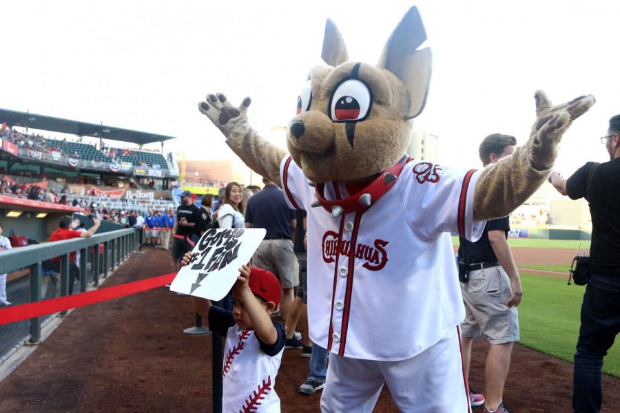 Third basemen Diego Goriss number one fan and Chico wait for the baseball player to come out of the locker room on opening night on Tuesday April 10, 2018. at Southwest University Park.