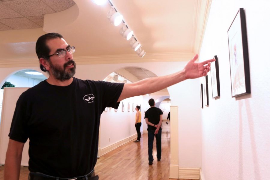 Guerra explains the process in which the print was made from the second Horned Toad Print Exhibit on Thursday. March 22 at la Galeria de la Mision De Senacu.  