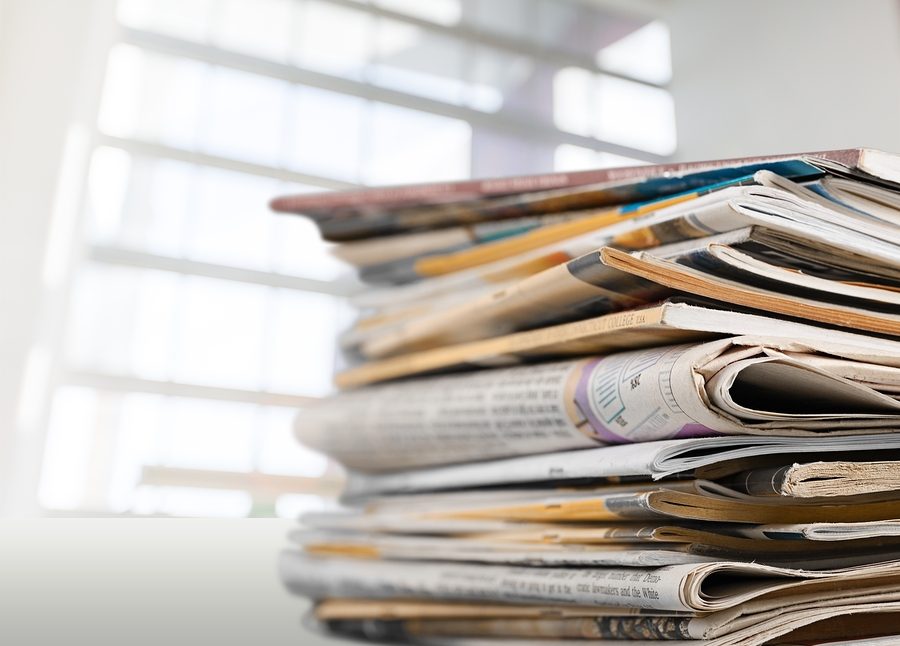 Paper news print pile newspapers print media pile of newspapers