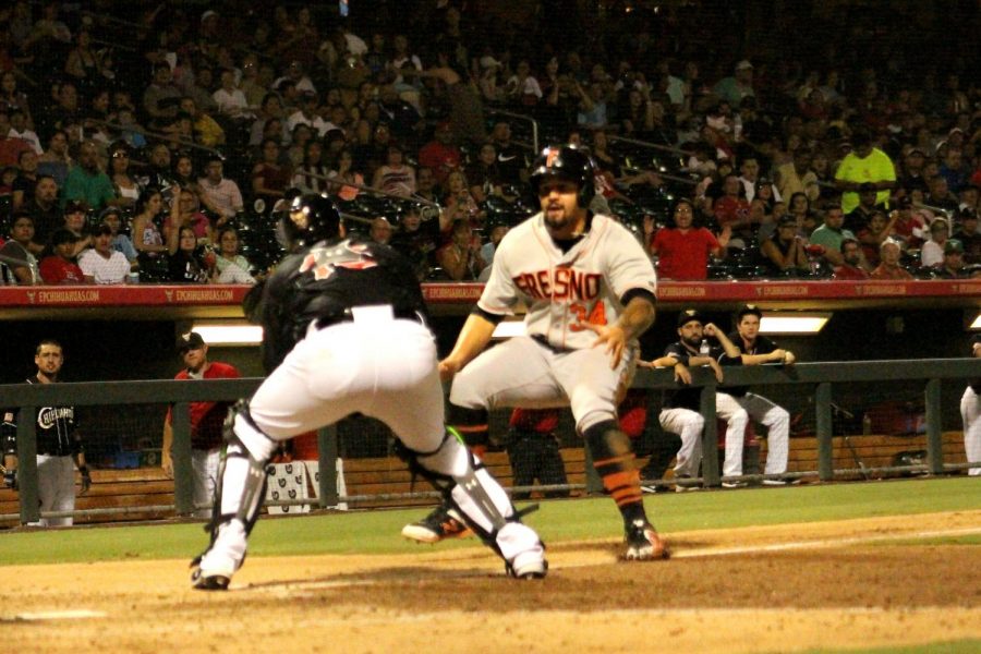 Nick Tanielu runs towards home base.