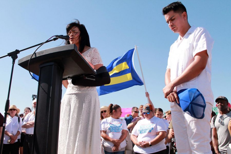 Speakers encourage protestors to register to vote at the #EndFamilyDetention rally at the Tornillo port of entry on Sunday, June 34. 