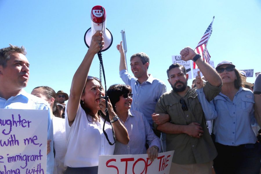 Congressman Beto ORourke and his supporters lock arms and march to the Tornillo Port of Entry on Sunday, June 17. 