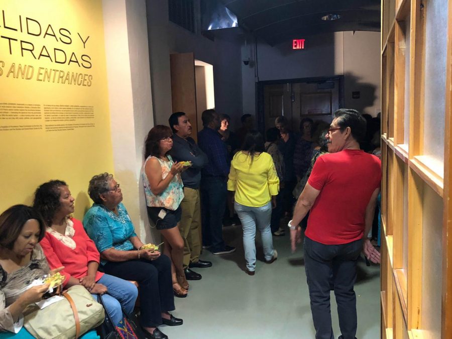 People waiting for the start of the mult- channel media installation of Jessica Hankey and Erin Johnson at the Rubin Center June 2.