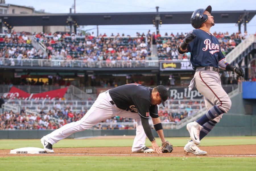 El+Paso+Chihuahuas+first+basemen+Allen+Craig+gets+a+Reno+Aces+runner+out+at+first+during+game+3+at+Southwest+University+Park+on+Saturday%2C+July+14.+