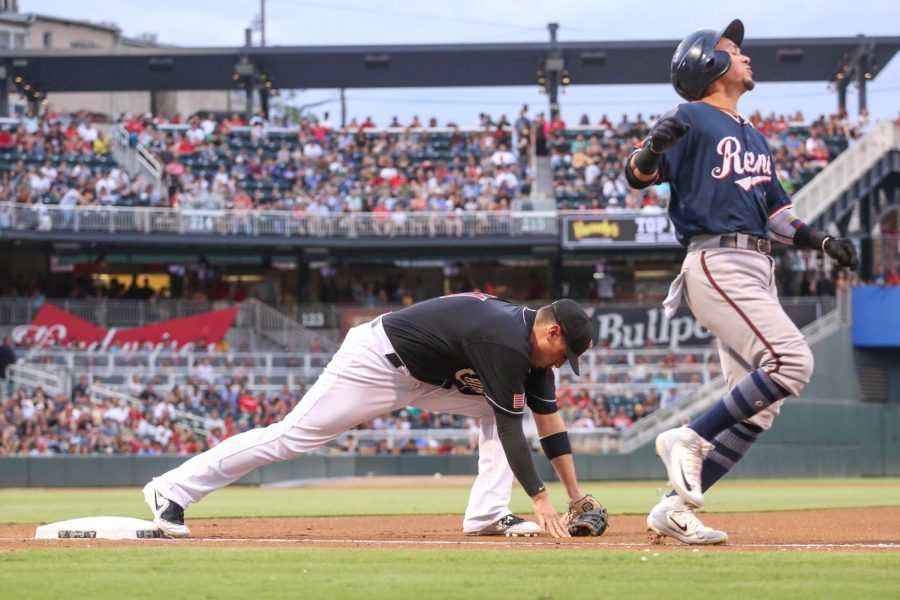 El Paso Chihuahuas first basemen Allen Craig gets a Reno Aces runner out at first during game 3 at Southwest University Park on Saturday, July 14. 