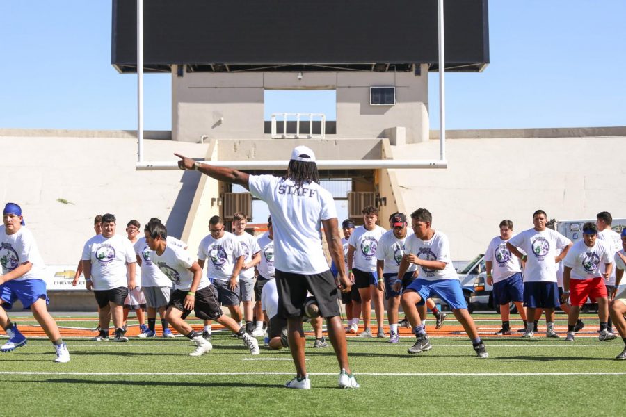 Aaron Jones works on drills with the campers on day two.  of the second Annual Jones Brothers Youth football camp. 