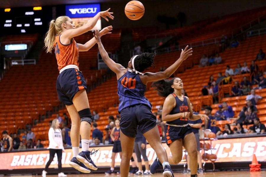 Junior guard Katarina Zec jumps to shoot the ball over sophomore point guard Jordan Jenkins. 