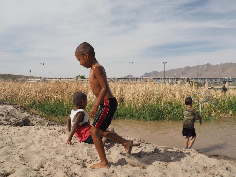 Portrait of children walking aside the Rio Grande River, near the El Paso dam, while waiting for their parents to finish fishing. Tuesday, April 11, 2017