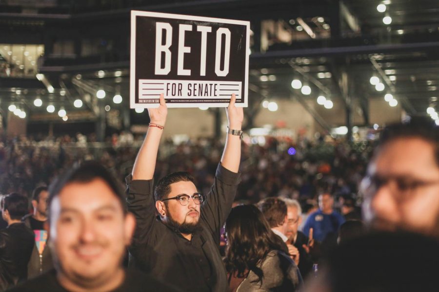 David Varela holds up a Beto for Senate sign at the beginning of ORourkes watch party on Tuesday, Nov. 6 at the Southwest University Park. 