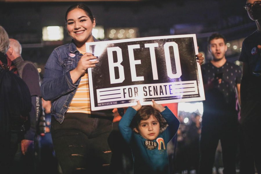 Anyssa and Madison Loya hold up a Beto for Senate sign at the beginning of ORourkes watch party on Tuesday, Nov. 6 at the Southwest University Park.