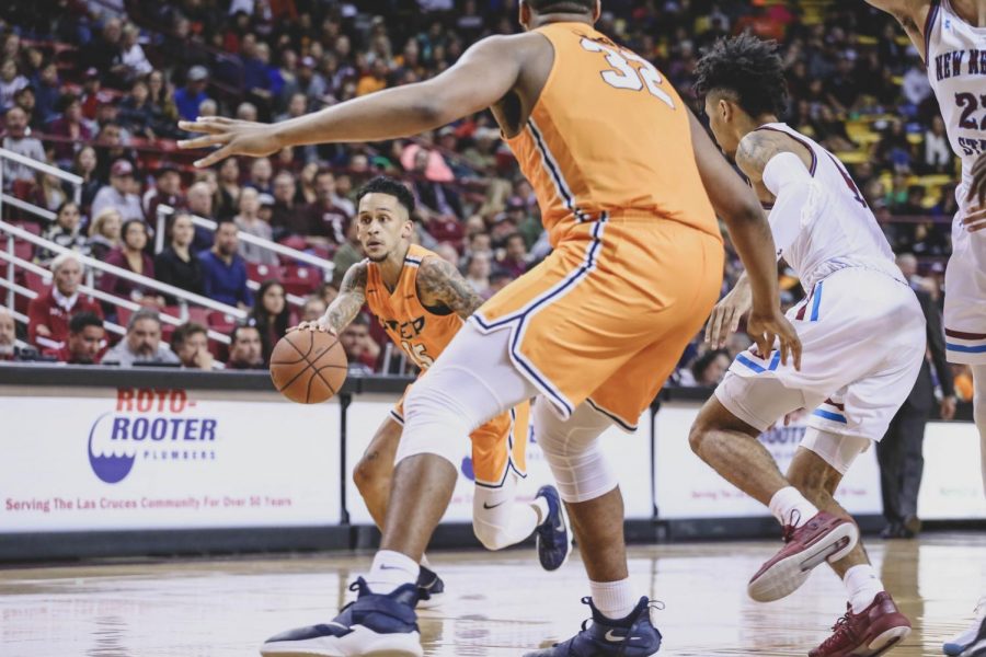 Sophomore guard Kobe Magee looks to run the lay up as he finished the game with 12 points.