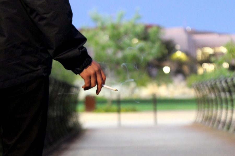 Although UTEP has instituted a tobacco-free policy, students still continue to smoke on campus. 